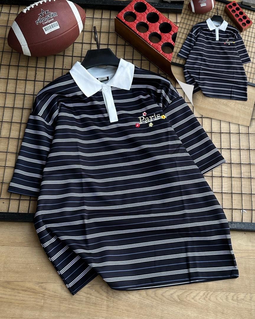 Black with white striped polo shirt with white collar and Paris embroidery.