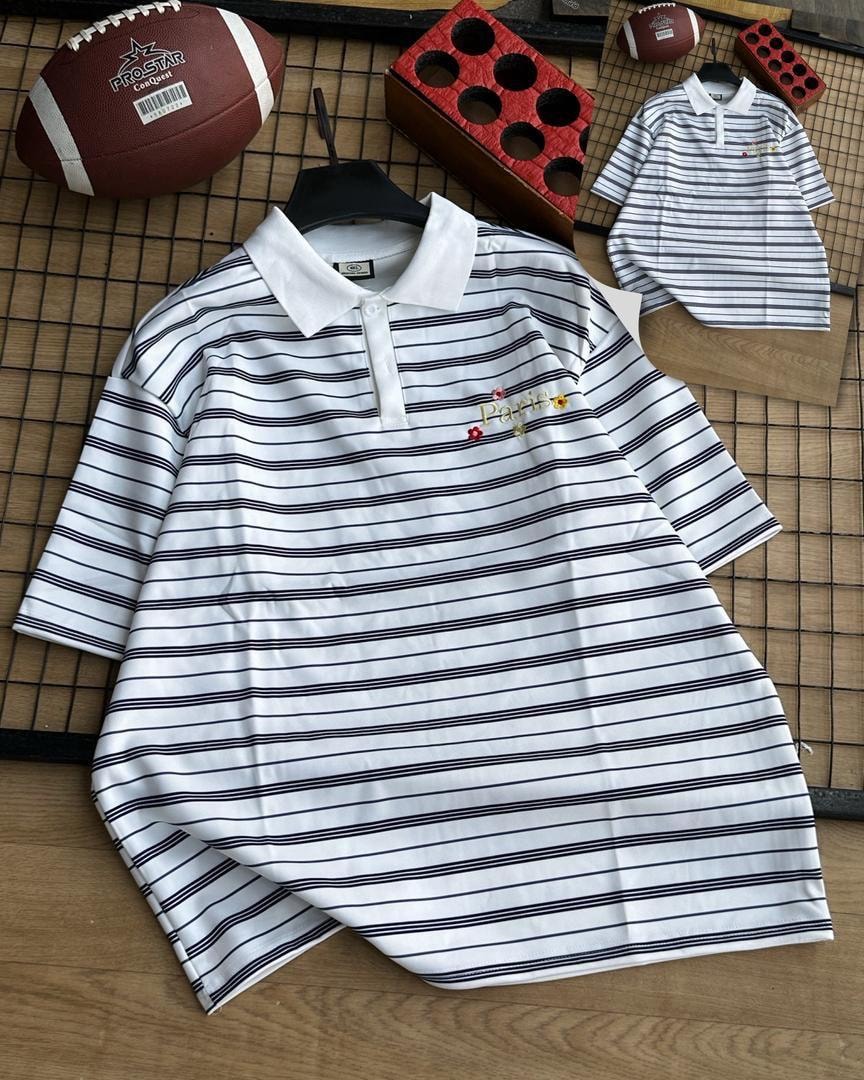 White with black striped polo shirt with white collar and chest embroidery.