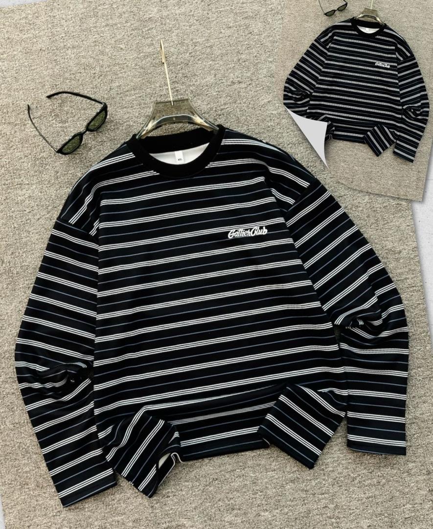 Black and white striped long sleeve sweatshirt with Gather Club embroidery on chest.