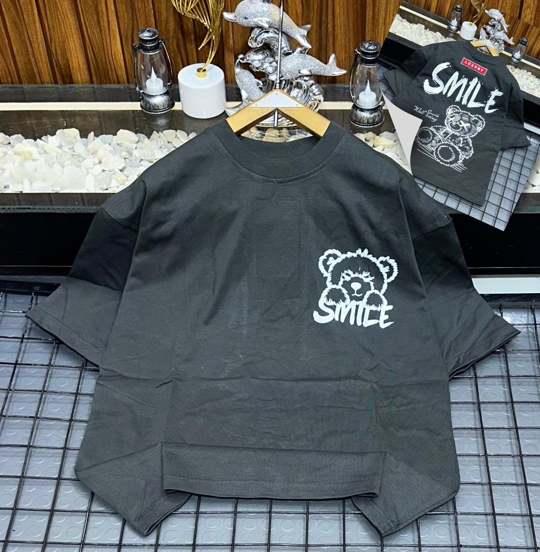Gray oversized t-shirt with white bear and SMILE graphic on chest, back view inset.