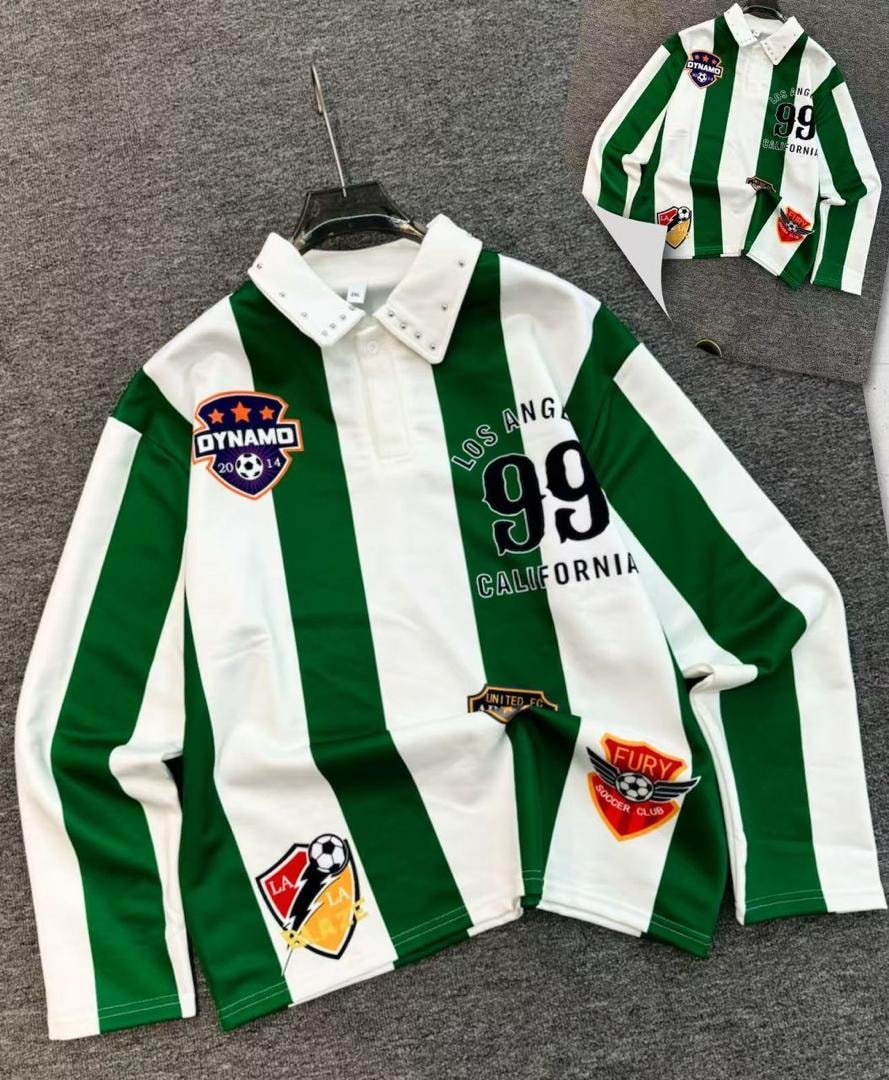 Green and white striped long-sleeve polo shirt with soccer patches and studded collar.