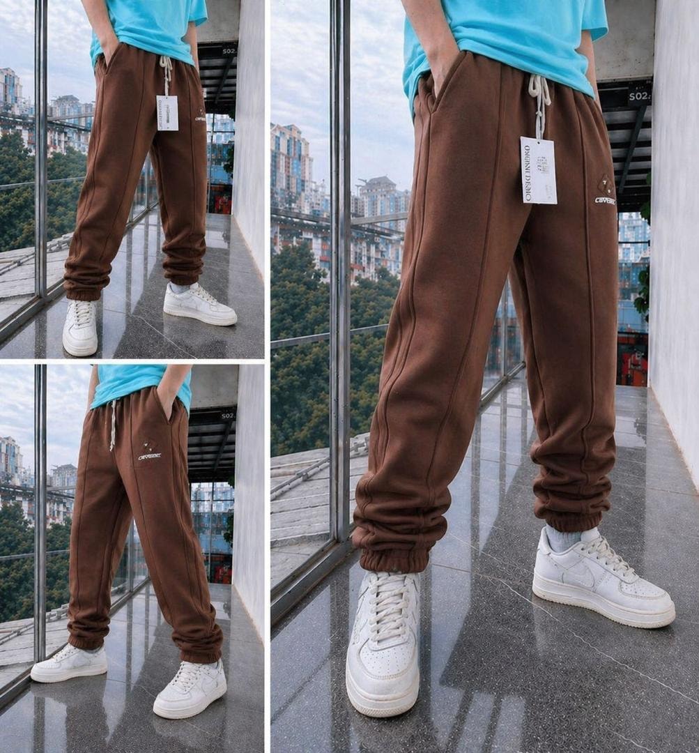 Brown fleece joggers shown in multiple angles on a model with blue t-shirt and white sneakers.