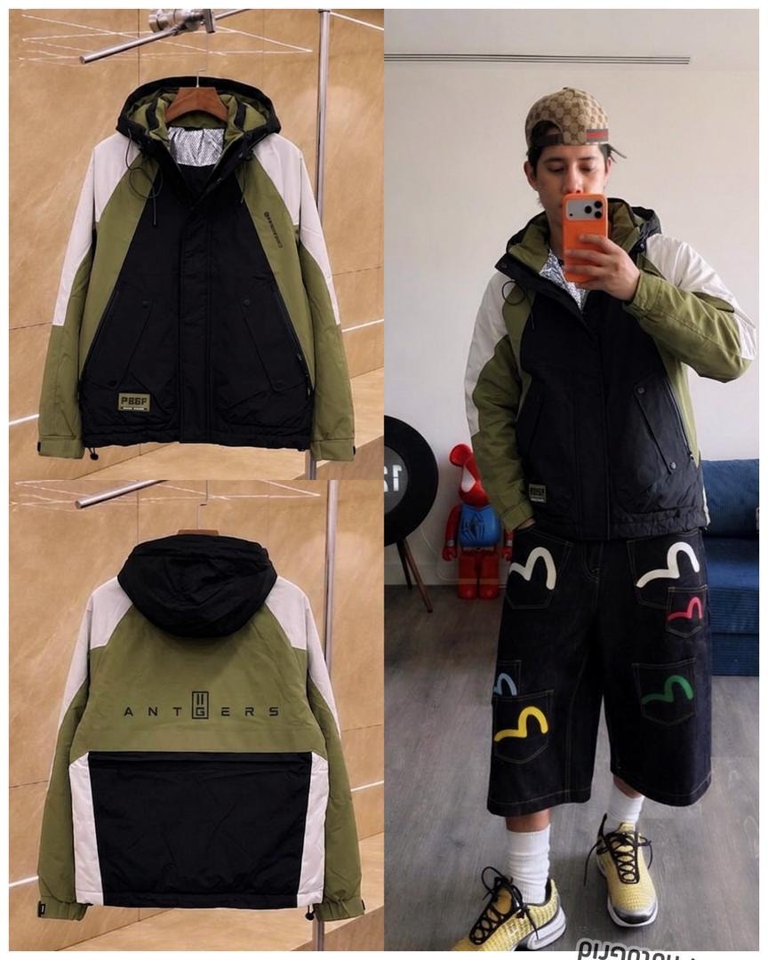 Black colorblock hooded jacket worn by model in casual outfit and shown on hanger.