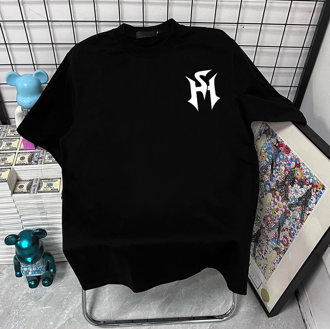 Black t-shirt with white stylized monogram logo on left chest.
