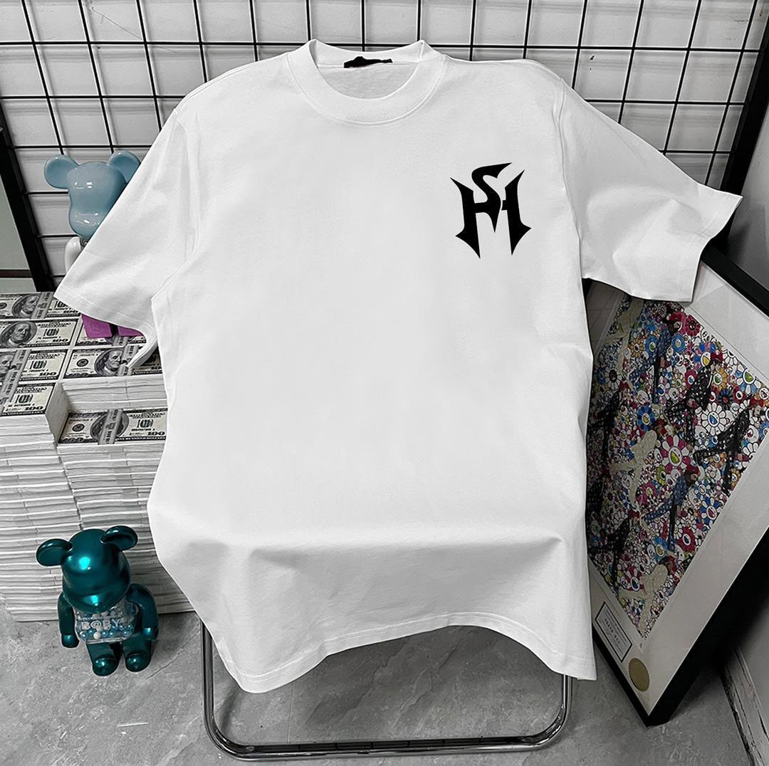 White t-shirt with black stylized monogram logo on left chest.