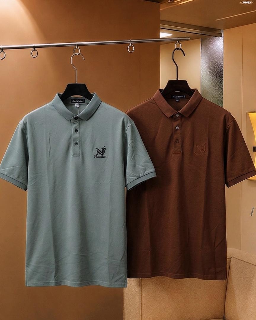 Light blue and brown Nautica polo shirts hanging side by side.