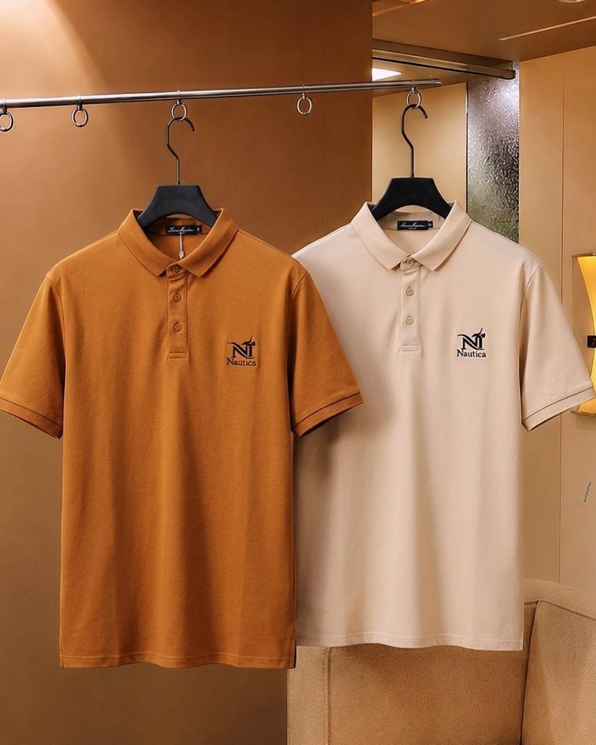 Mustard orange and cream Nautica polo shirts hanging side by side.