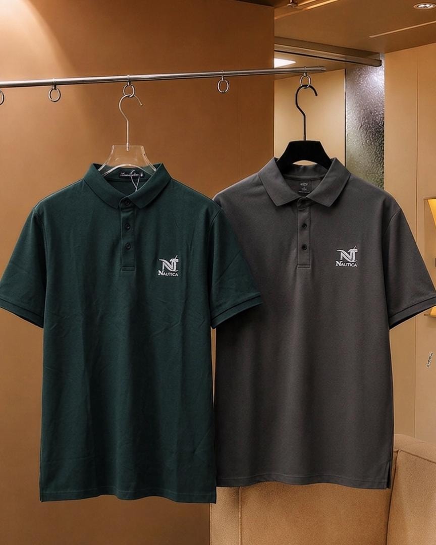 Dark green and gray Nautica polo shirts hanging side by side.