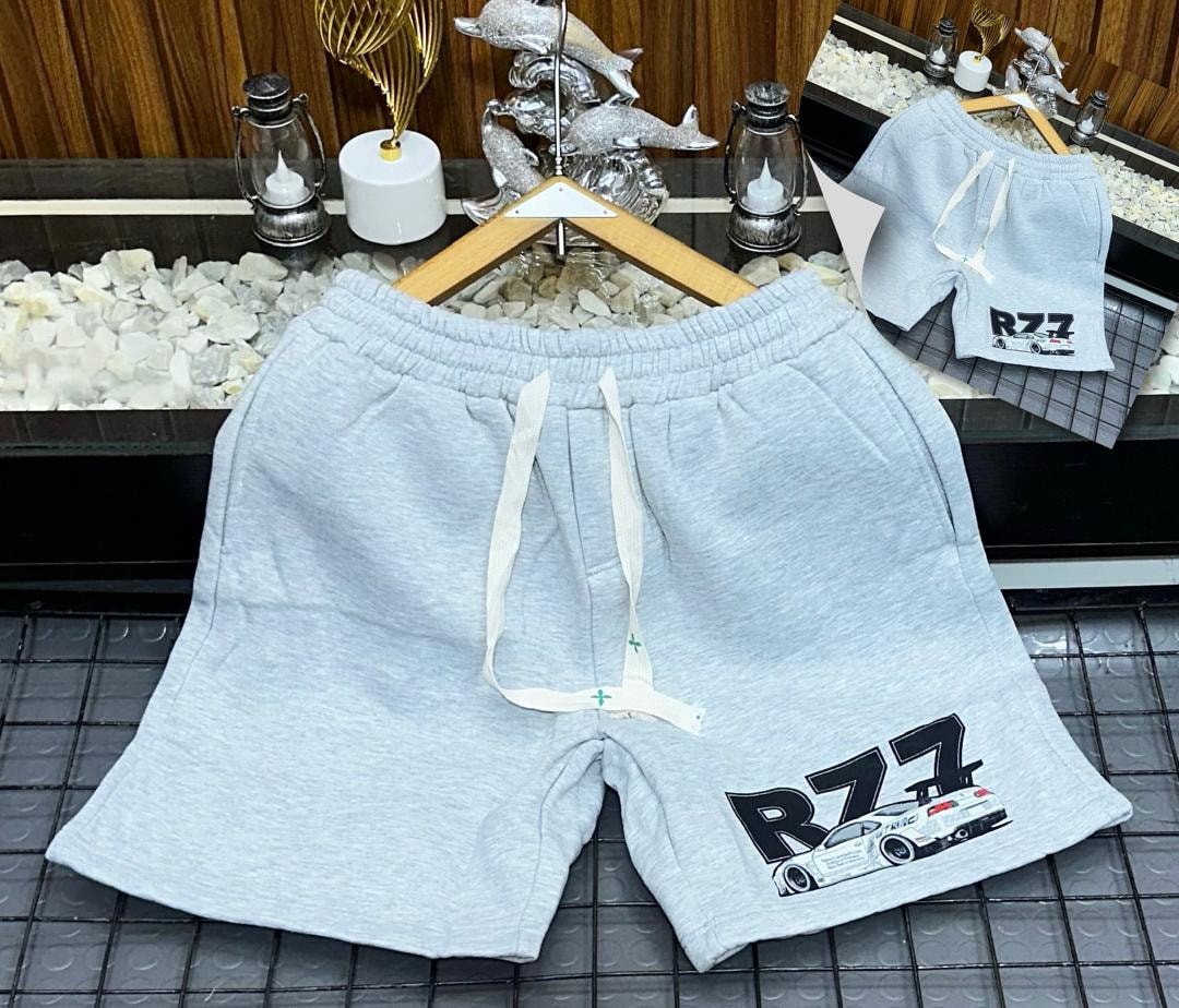 Light blue fleece shorts with R77 car graphic print.