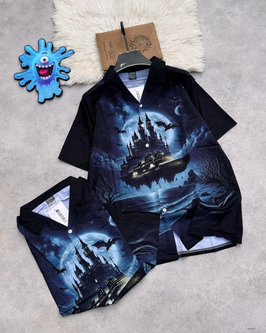 Short sleeve shirt with dark castle moon and bat night scene print.