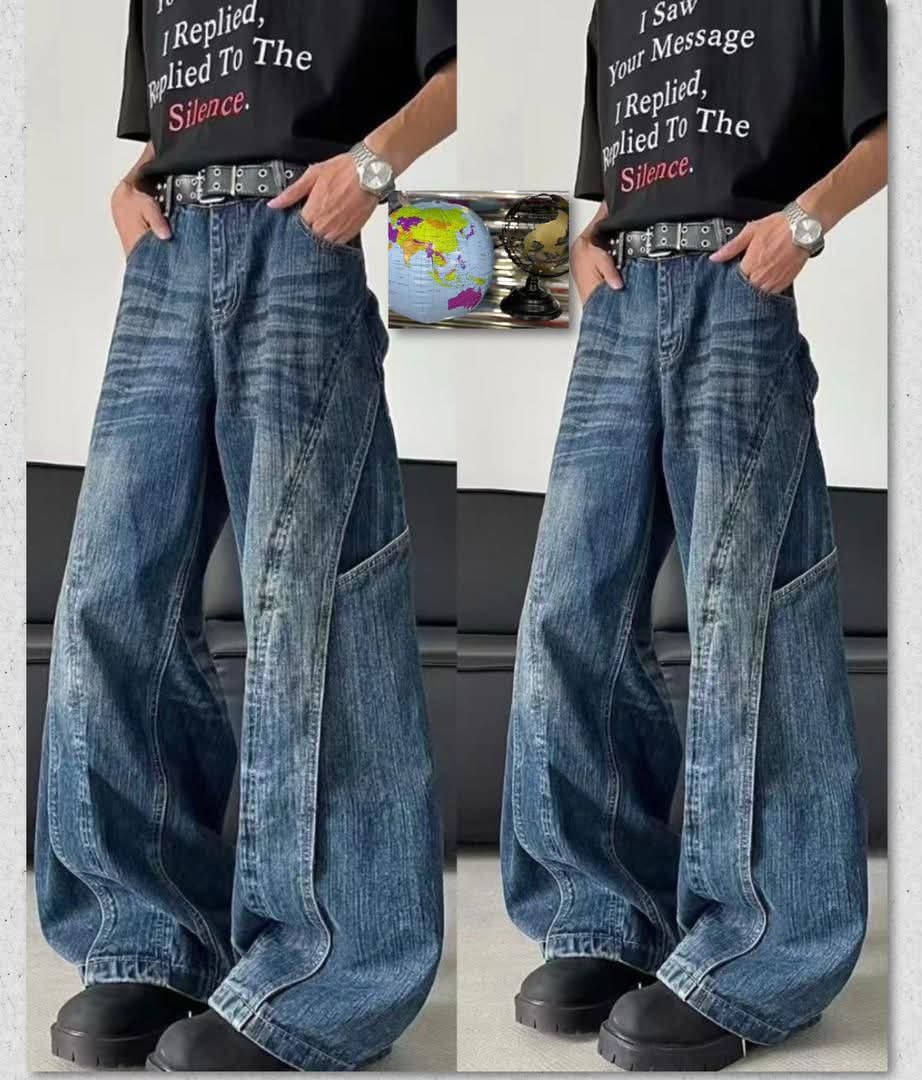 Model wearing dark blue wide leg baggy jeans with side panel seams, shown in two angles.