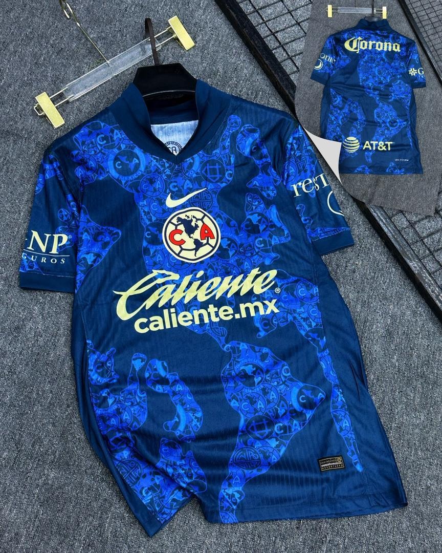 Blue Club America soccer jersey with intricate patterns and club badge.