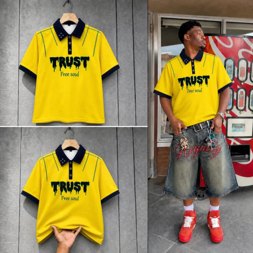 Yellow polo shirt with Trust Free Soul print shown flat and on model.
