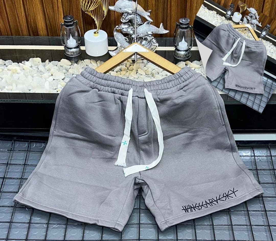 Gray fleece shorts with black embroidered logo on leg.