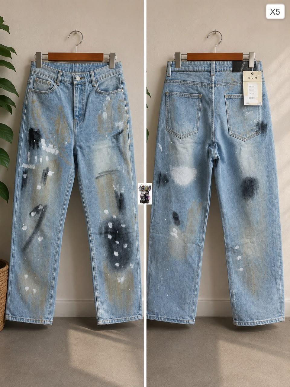 Light blue splatter baggy jeans by DCM shown in front and back views.