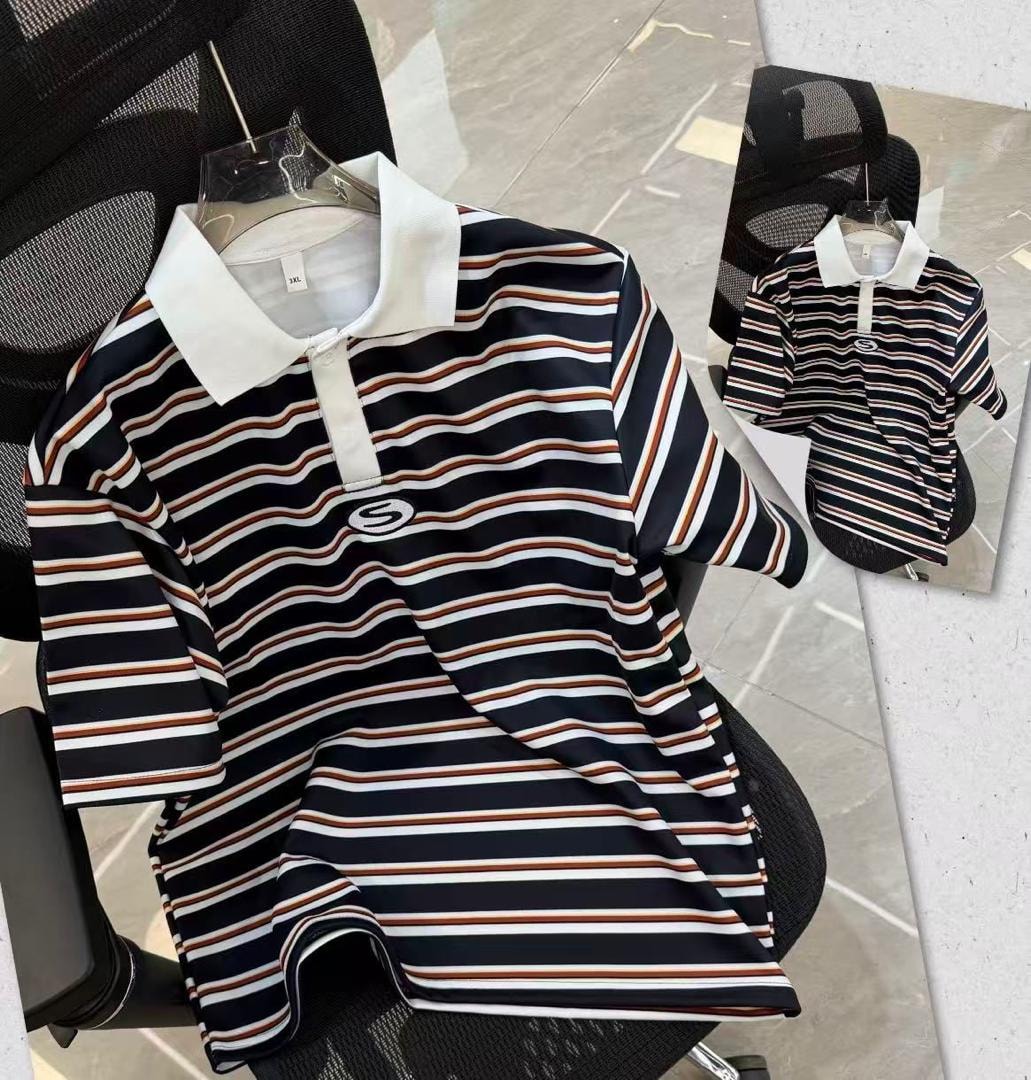 Navy wavy striped polo shirt with white collar and S logo on black chair.