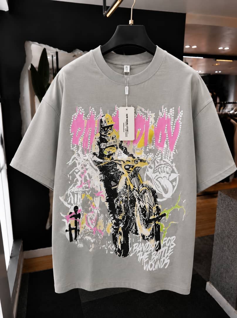 Gray oversized t-shirt with on the move biker motorcycle graphic print.