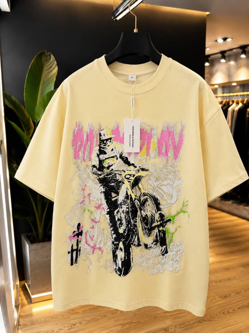 Cream oversized t-shirt with on the move biker motorcycle graphic print.