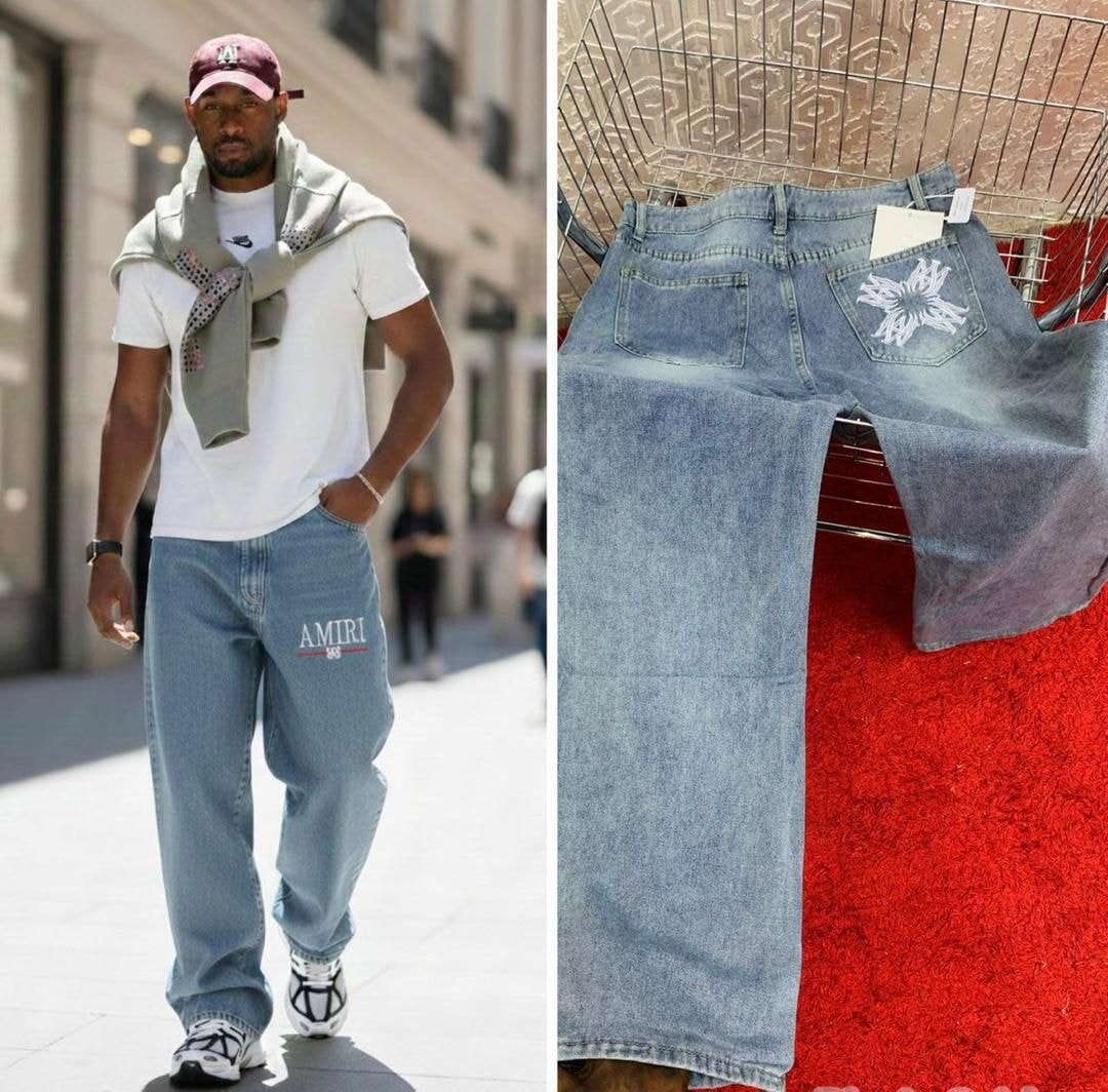 Collage of man in white t-shirt and light blue AMIRI logo jeans on city street plus back view of jeans with white flower embroidery on pocket in shopping cart.