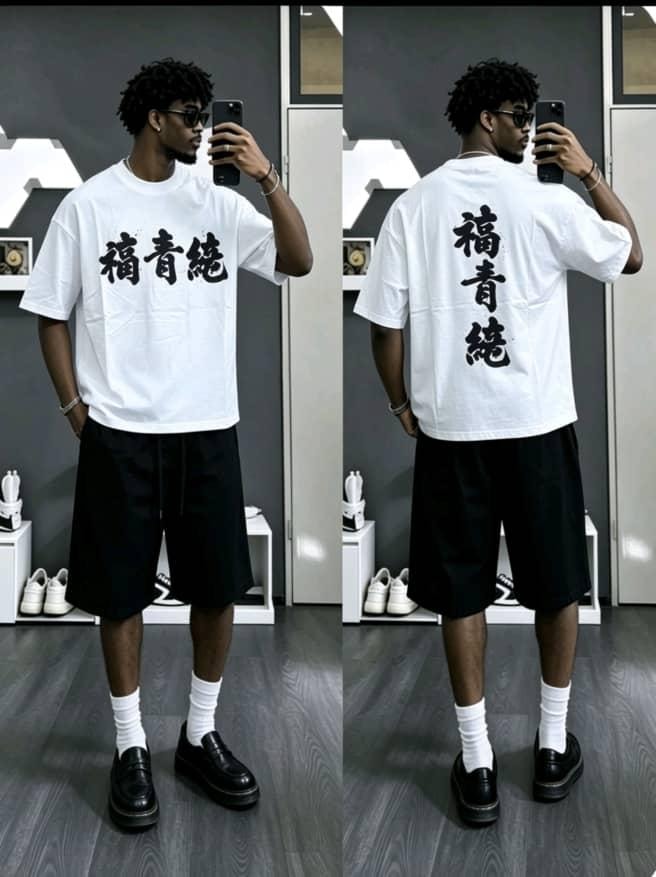 Man modeling white oversized t-shirt with Chinese calligraphy on front and back.