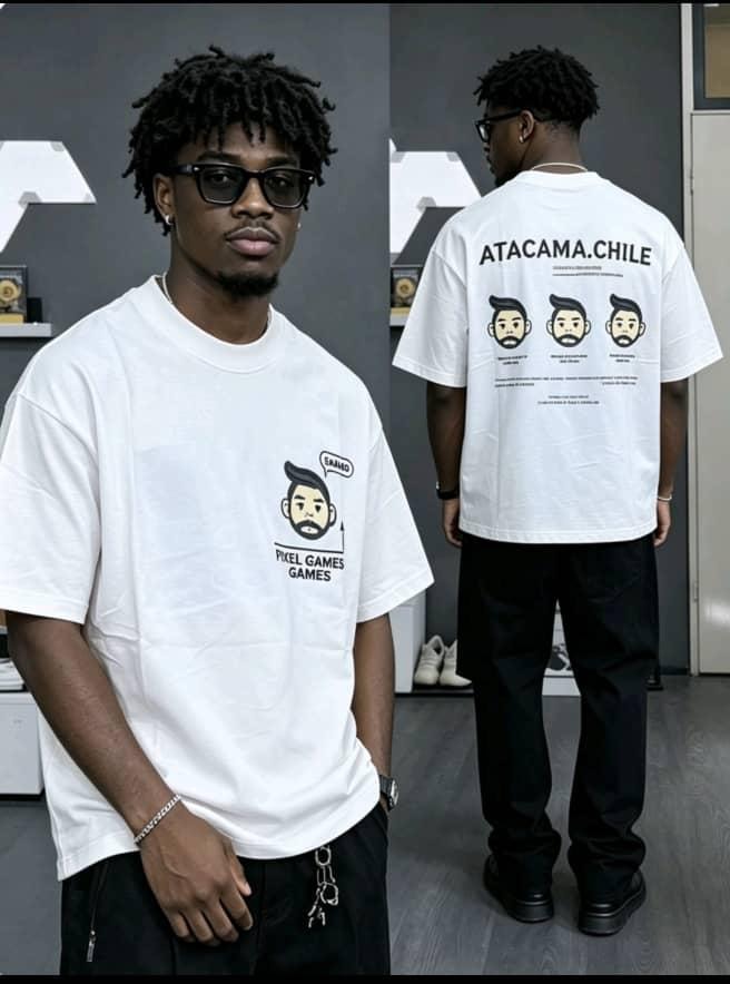 Model wearing white Atacama Chile pixel games t-shirt with front cartoon and back print.