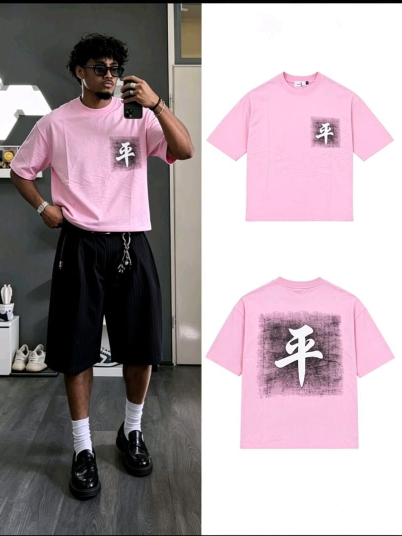 Model wearing pink kanji print t-shirt with chest and large back print.