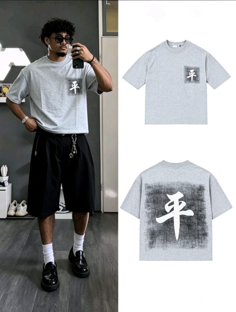 Model wearing gray kanji print t-shirt with chest print and back view.