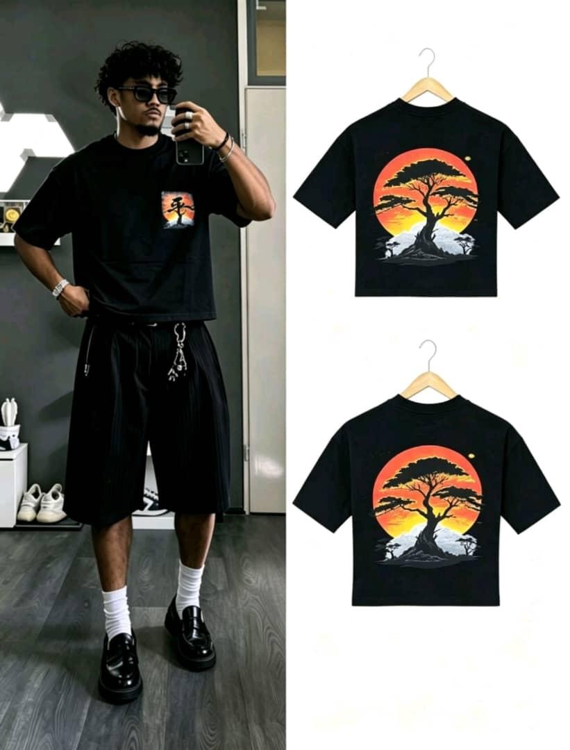 Man wearing black sunset tree graphic t-shirt next to product images of front and back.