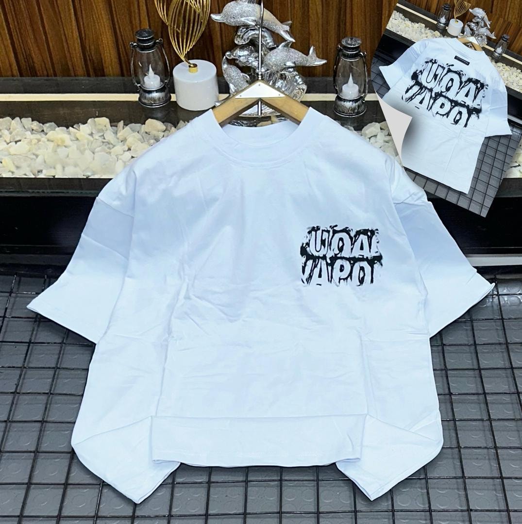 White oversized t-shirt with black dripping logo print on chest, shown on hanger with back inset.