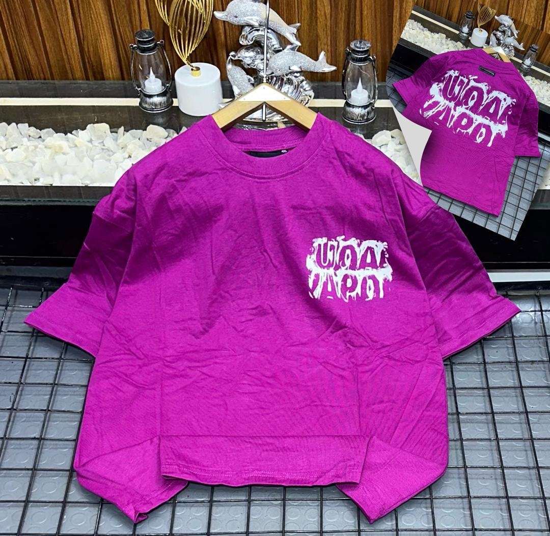 Purple oversized t-shirt with white dripping logo print on chest, shown on hanger with back inset.