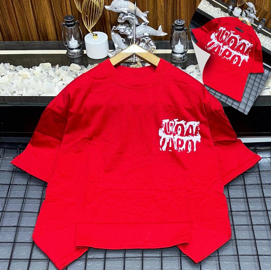 Red oversized t-shirt with white dripping logo print on chest, shown on hanger with back inset.