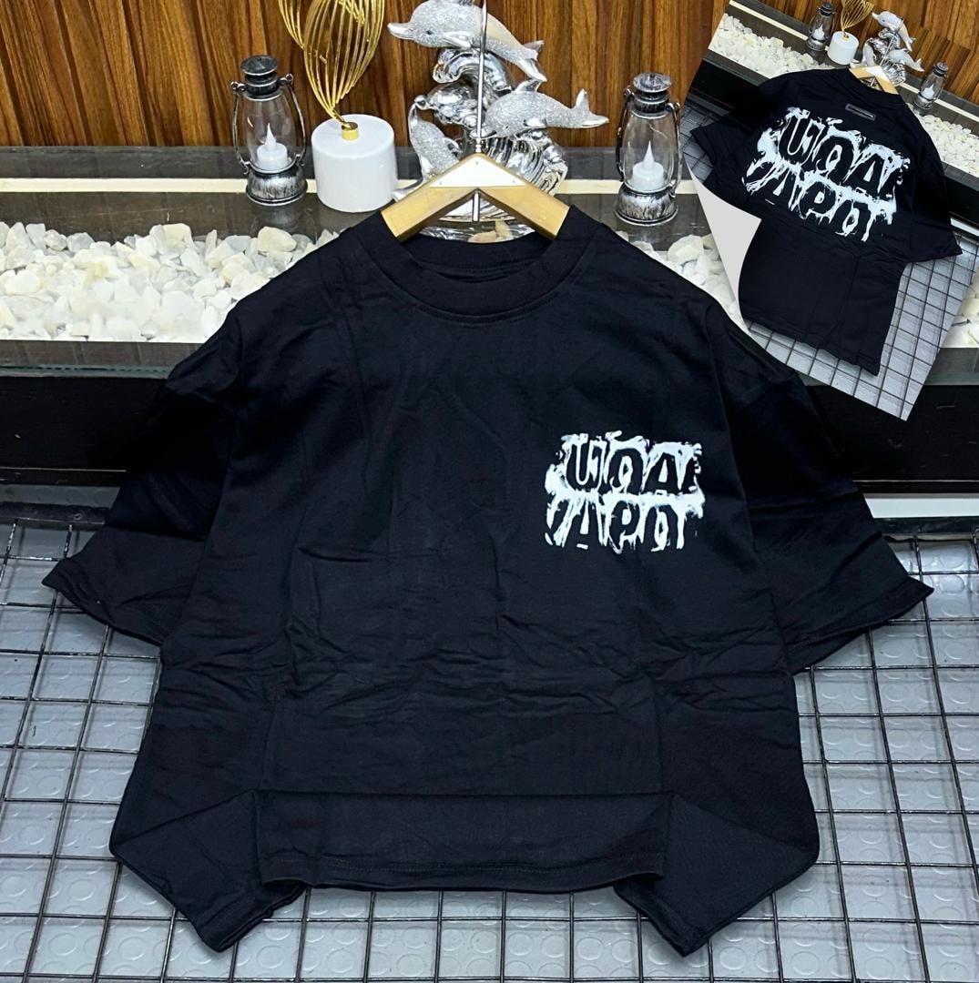 Black oversized t-shirt with white dripping logo print on chest, shown on hanger with back inset.