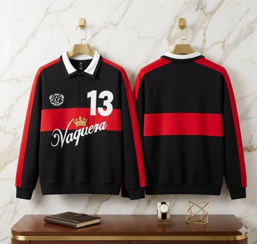 Black Vaquera 13 polo sweatshirt front and back on hangers with red stripes and white script.