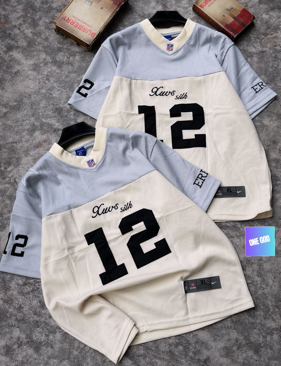 Gray and cream two-tone mesh jersey with Xavs Silk 12 graphic on chest.