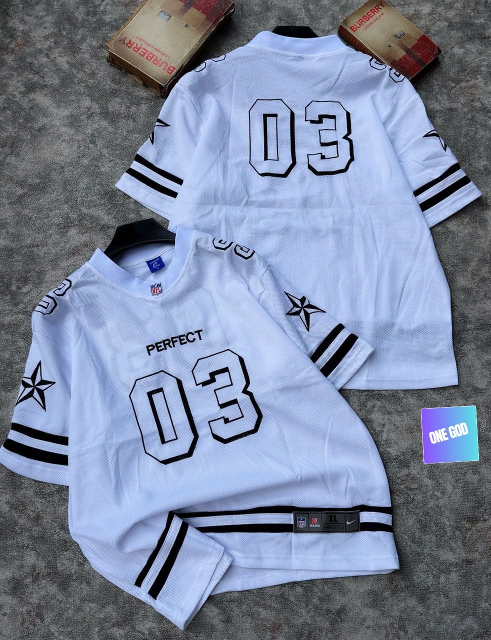 White mesh jersey with black stripes, PERFECT and 03 graphics.