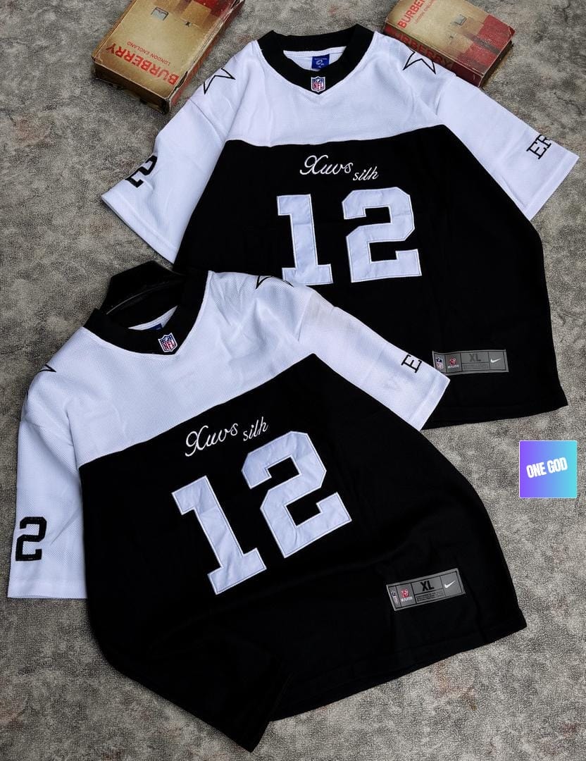 Black and white two-tone mesh jersey with Xavs Silk 12 graphic on chest.