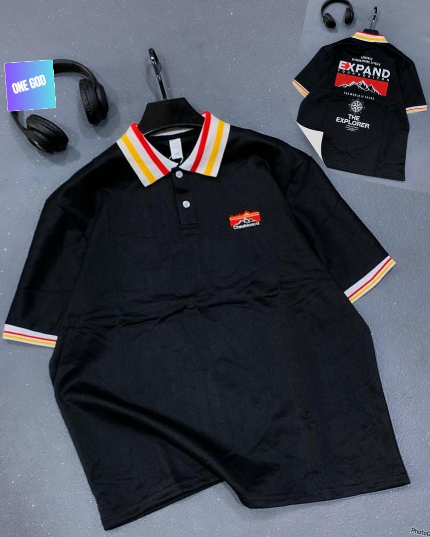 Black polo shirt with striped collar, mountain chest logo and large back explorer print.