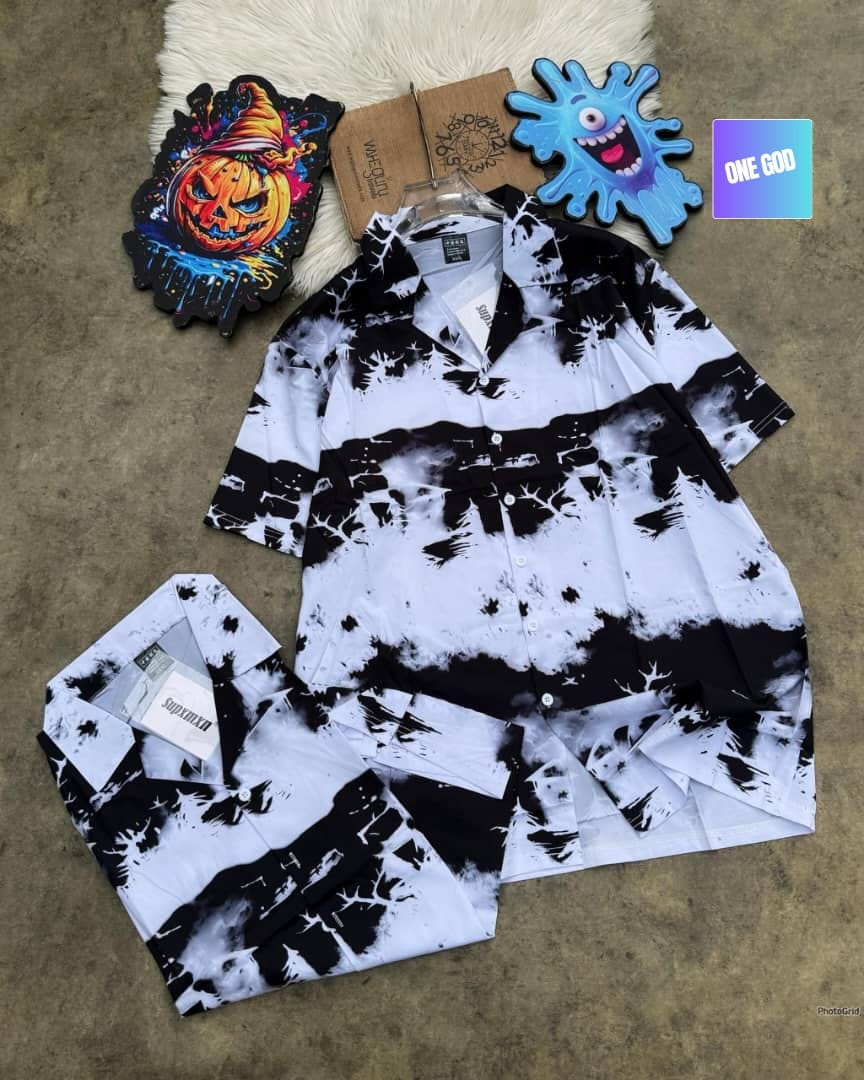 Black and white short sleeve shirt with forest and tree tie-dye print.