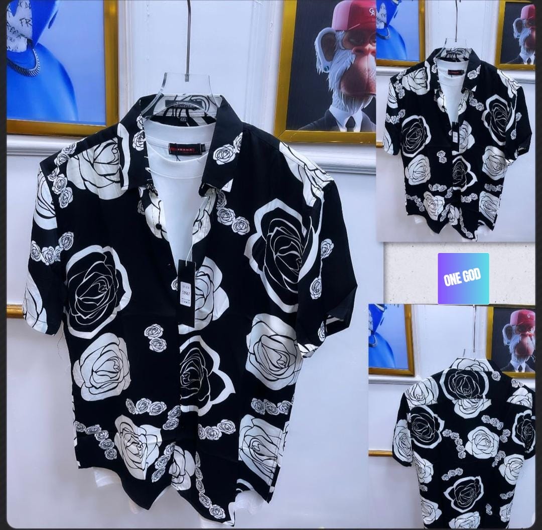 Black short sleeve shirt with white rose pattern shown in multiple views including front, side and back.