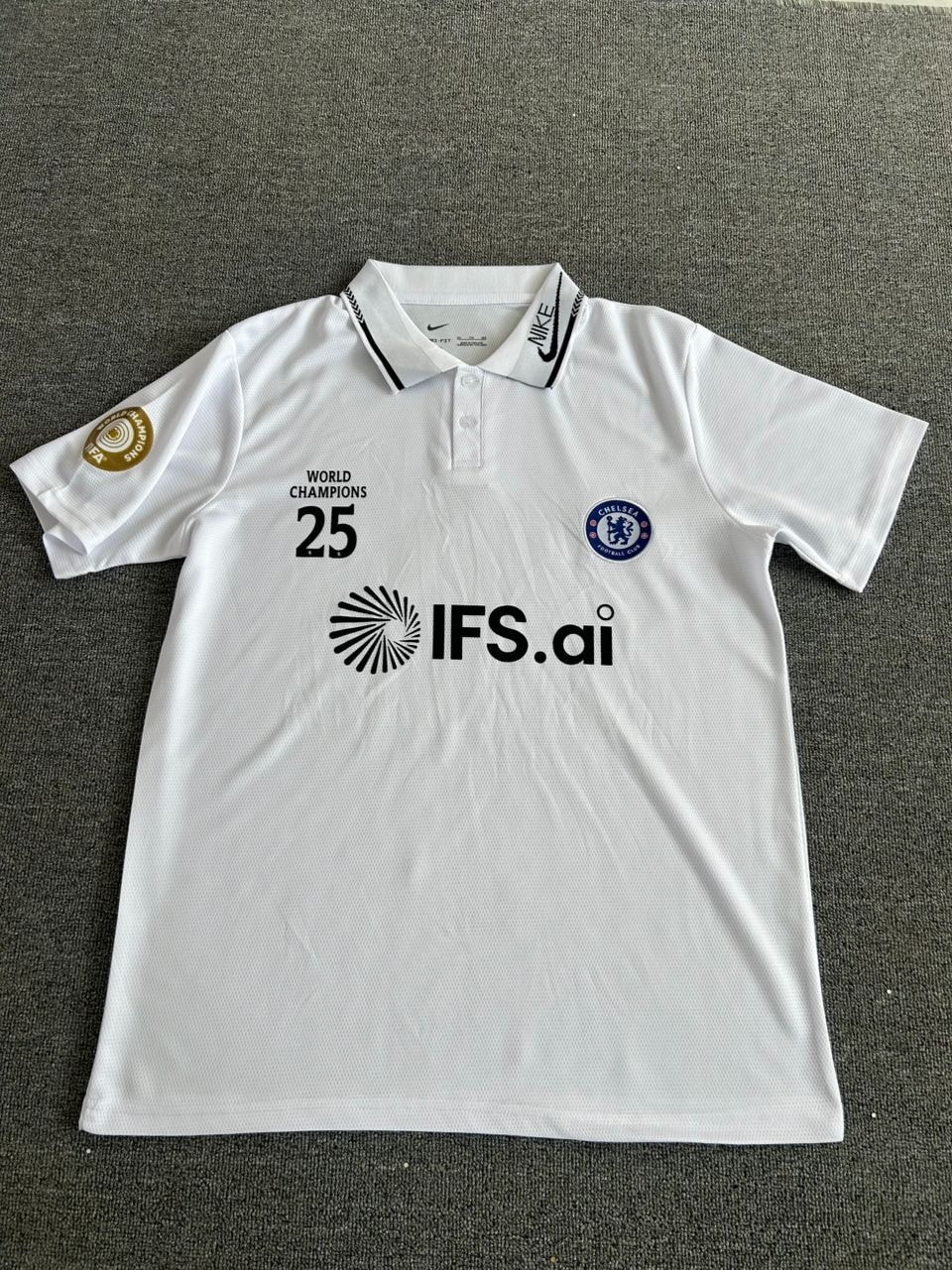 White Chelsea polo jersey laid flat on gray surface displaying all logos and prints.