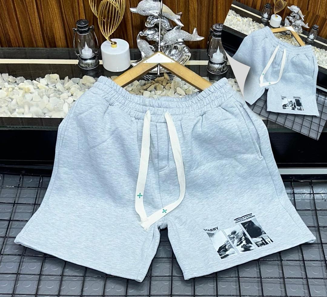 Light gray unisex shorts with starry landscape photo print.