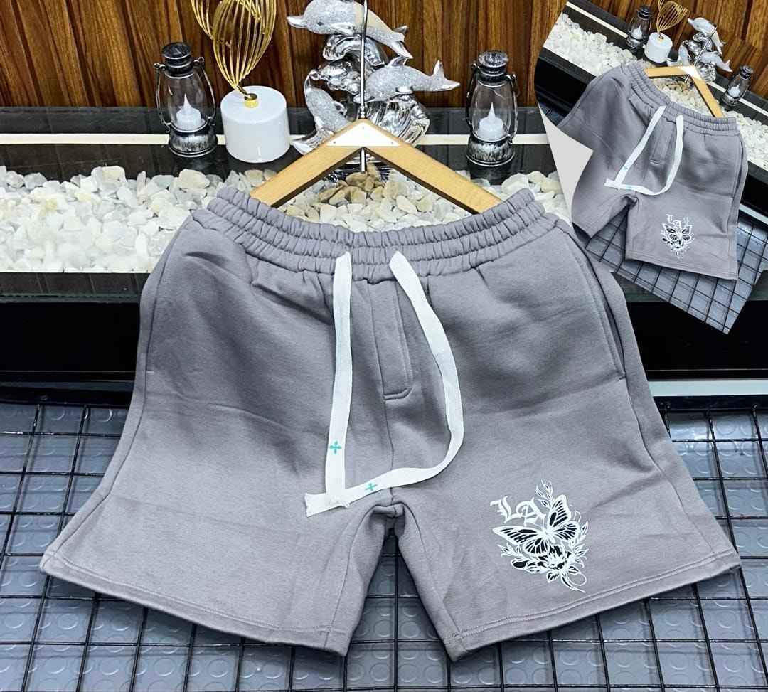 Gray unisex shorts with white butterfly embroidery on leg.