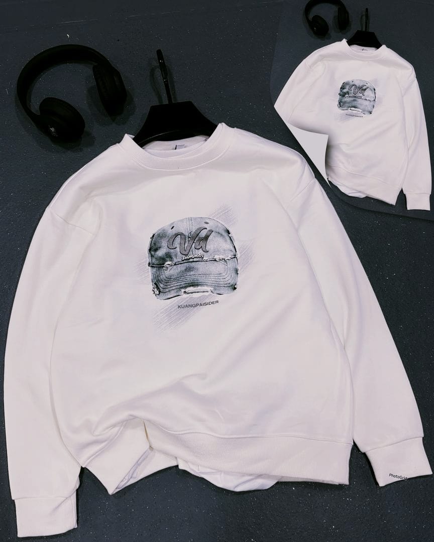 White crewneck sweatshirt with large vintage baseball cap graphic and text on front, small back view shown.