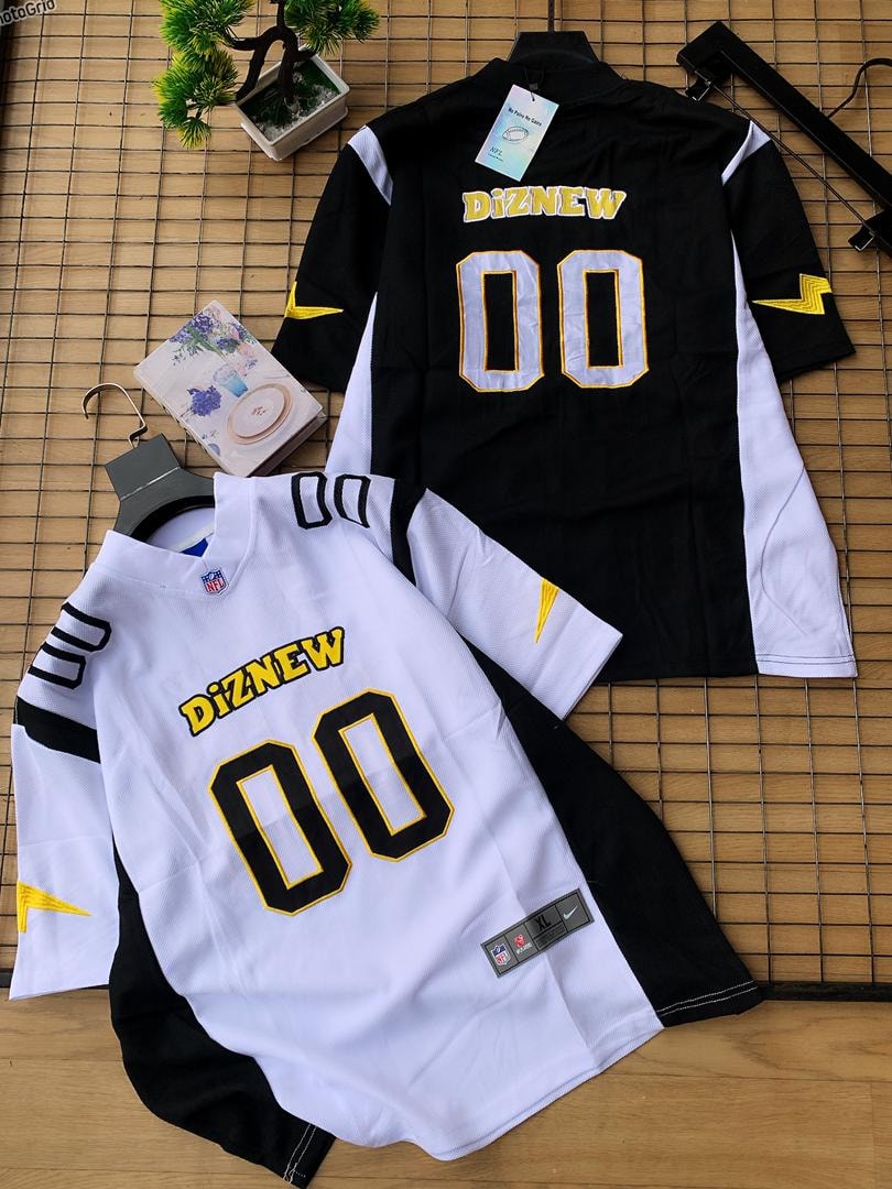 Black/white and white/black Diznew 00 football jerseys displayed with decorative items.