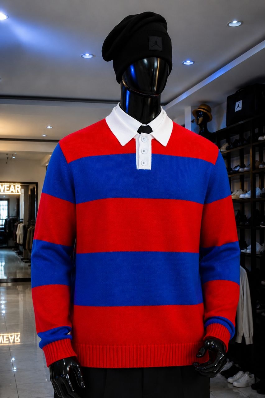 Mannequin in red and blue striped knit polo top with collared shirt and beanie.