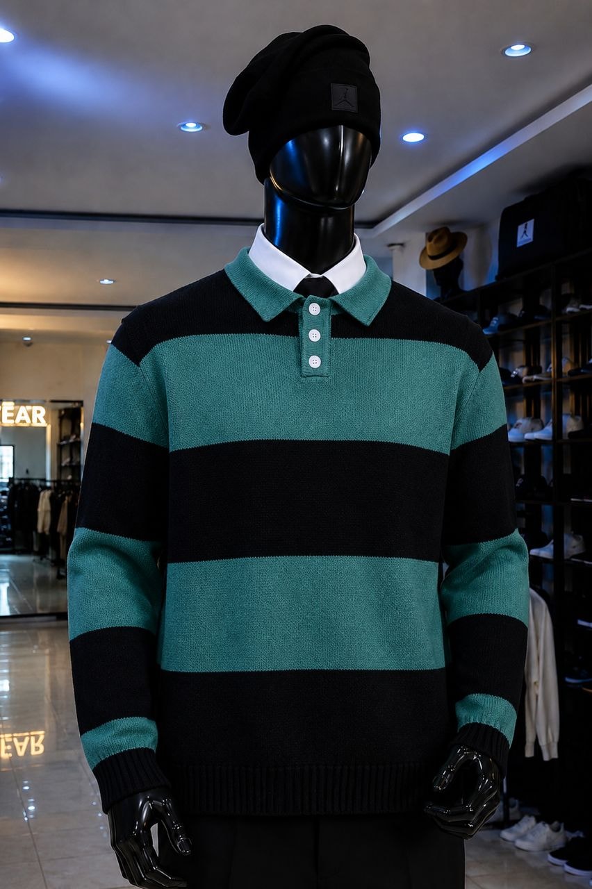Mannequin in black and teal striped knit polo top with collared shirt and beanie.