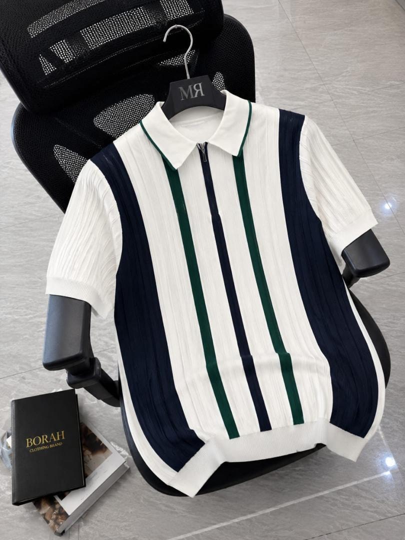 Borah white vertical striped quarter-zip polo shirt on black office chair beside brand box.