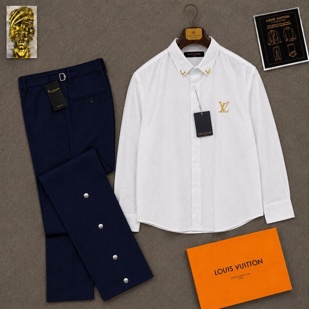 White long sleeve LV monogram shirt paired with navy trousers and orange LV box.