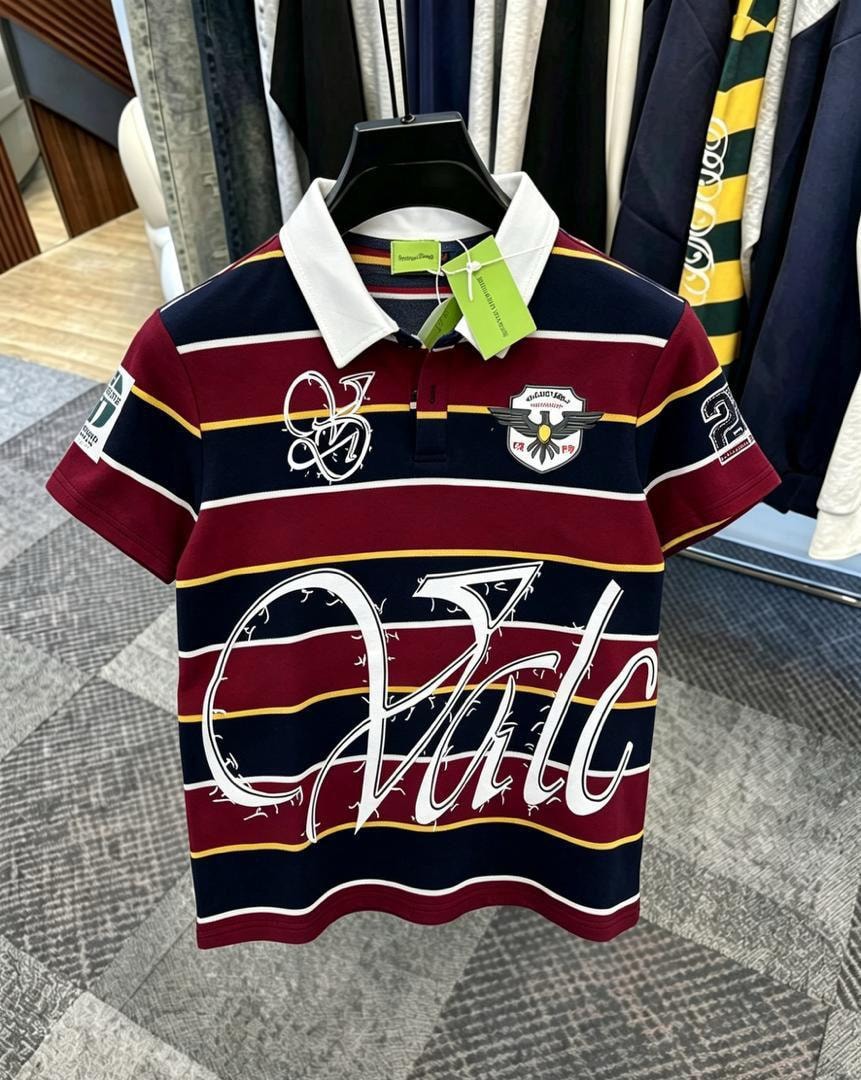 Front view of burgundy striped polo shirt with white collar, chest embroidery and logos.