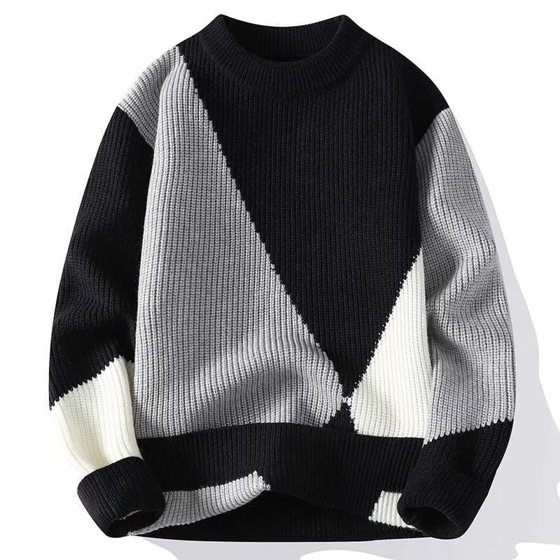 Black gray and white geometric colorblock knit sweatshirt laid flat.